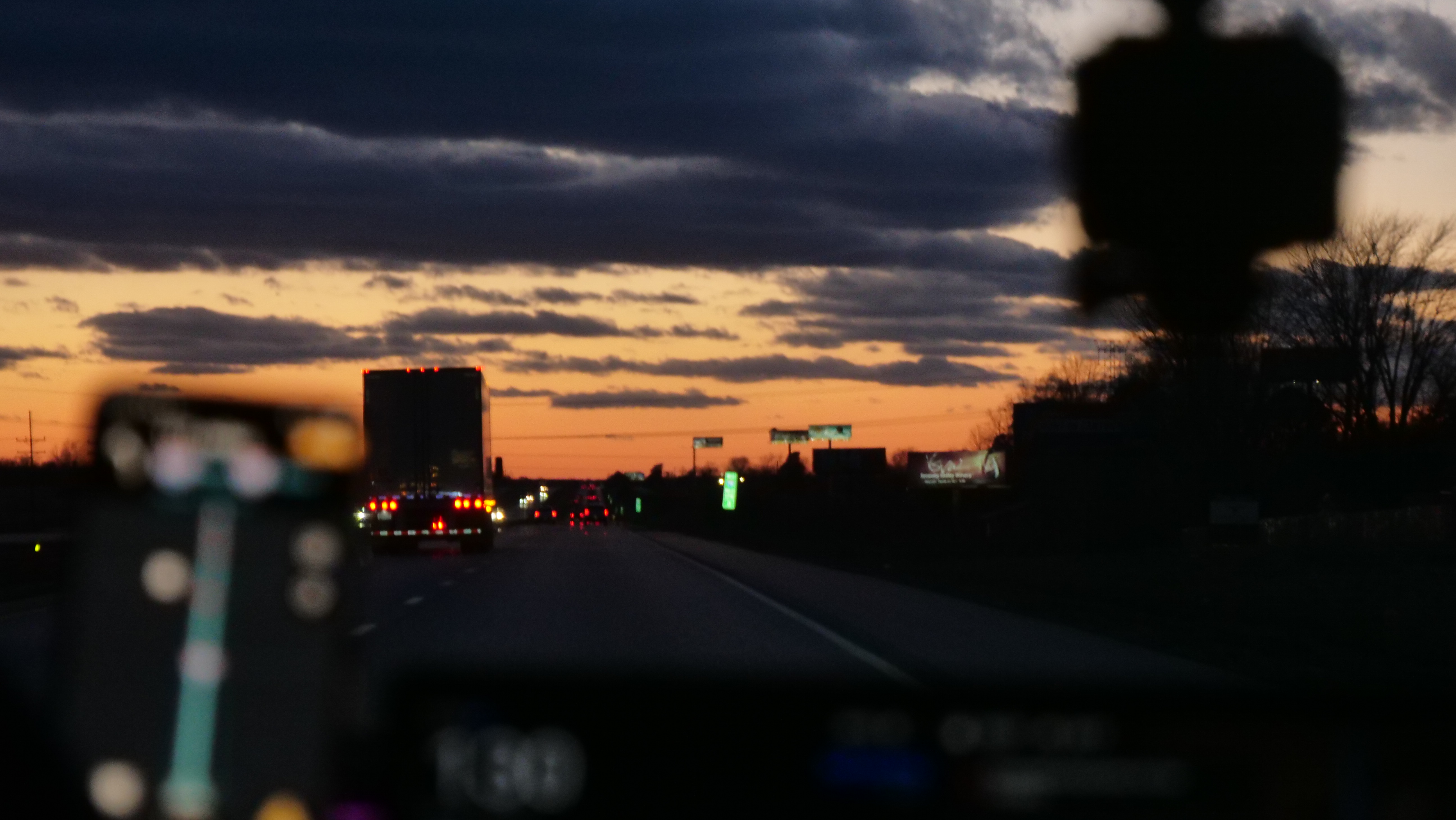 Night highway view from inside the tour vehicle.