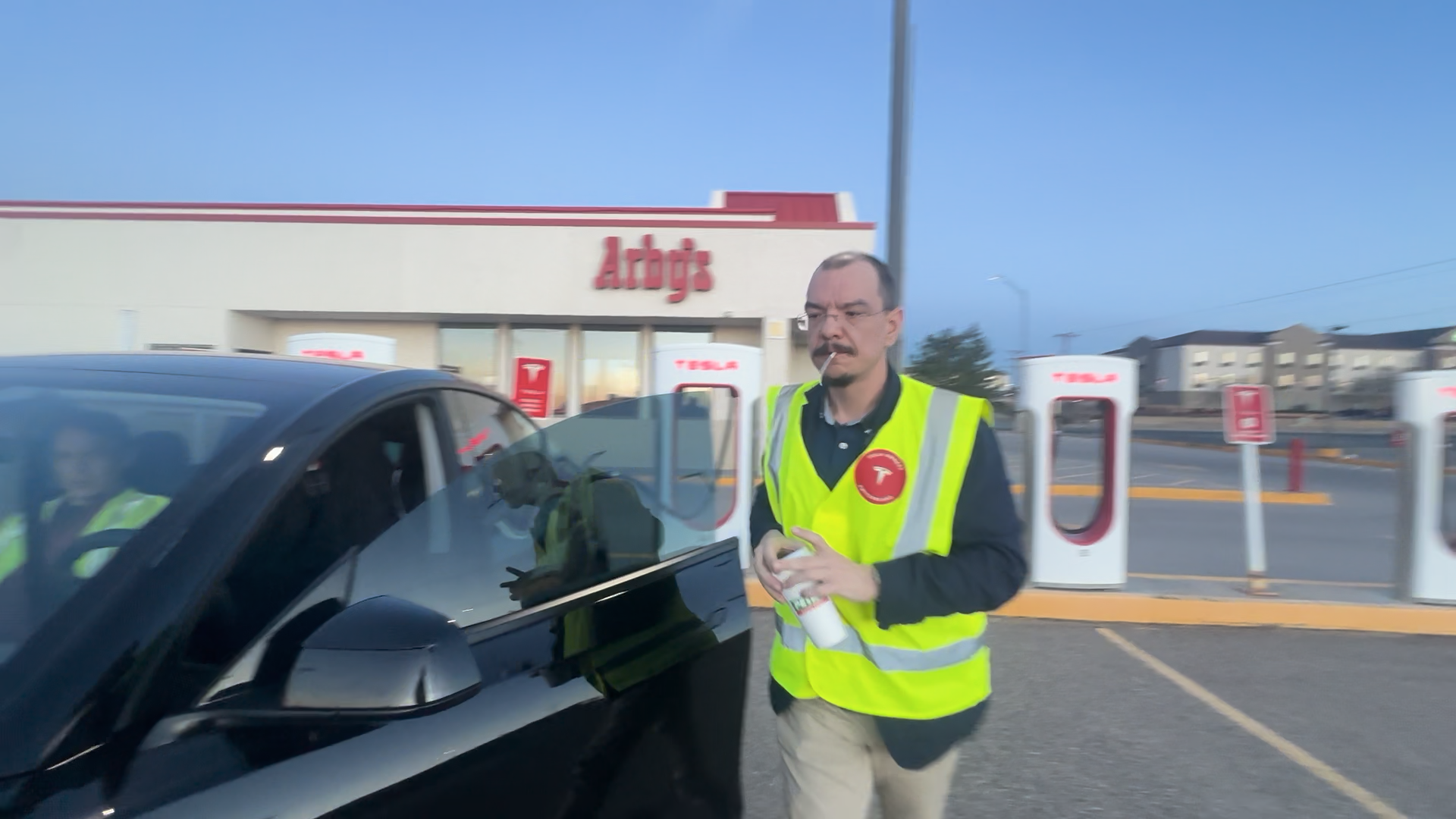 Georg at one of many charging stops on the road.